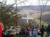 good picts of cross with people singing.jpg (40398 bytes)
